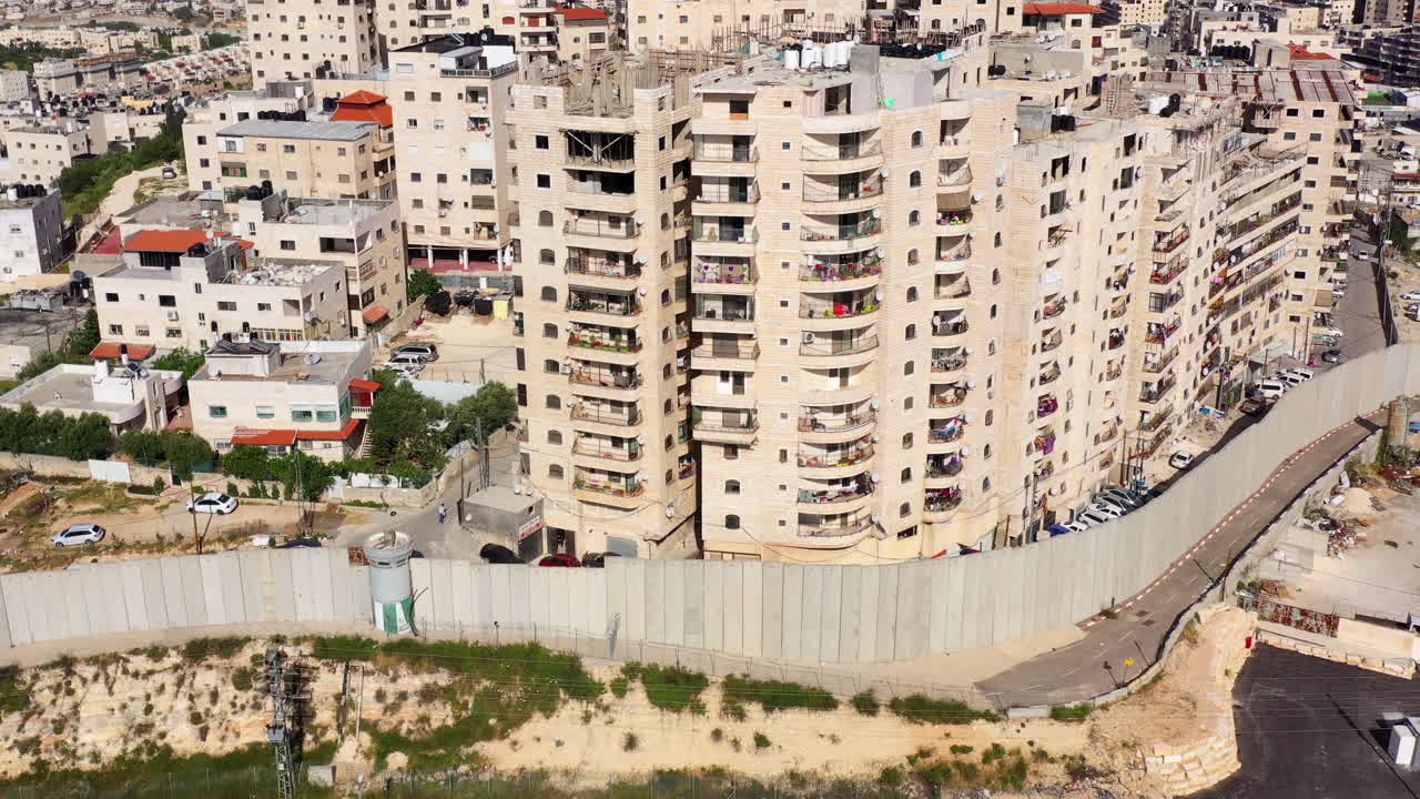 Security wall with Israeli idf watch tower Close to Anata Refugee Camp- Aerial