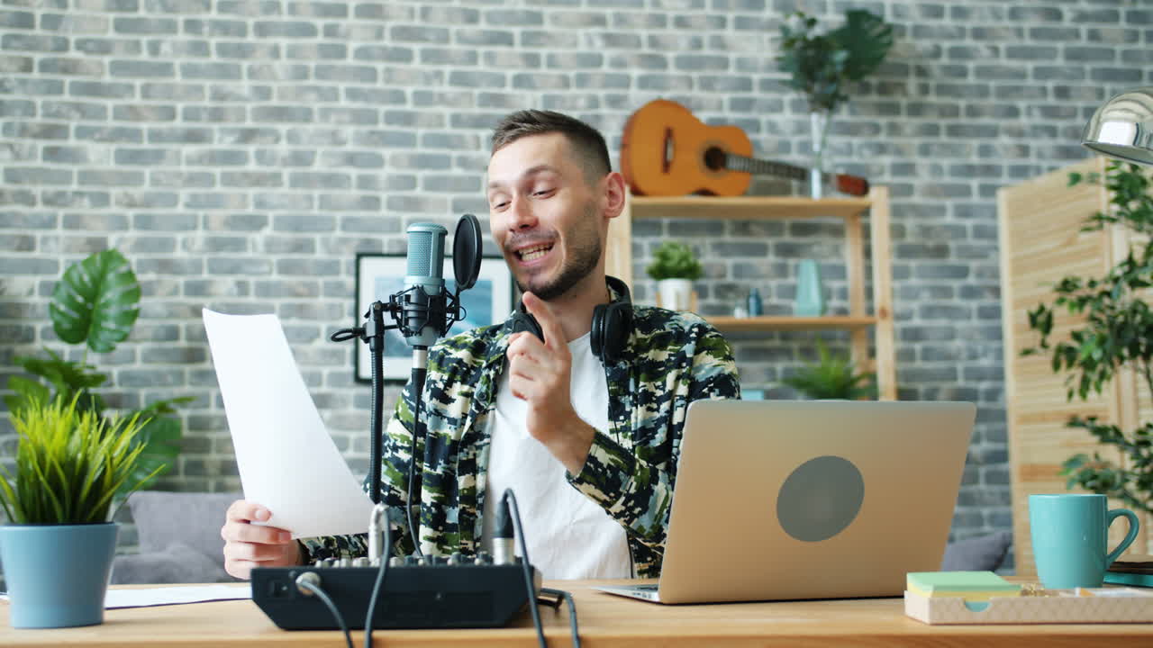 Man Recording Podcast in Home Studio