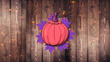 pumpkins and autumn leafs on wood with glitters