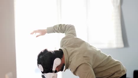 young man exploring cyberspace in vr goggles at home