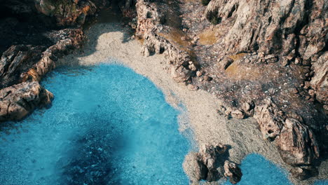 aerial view from flying drone of rocky island in atlantic ocean