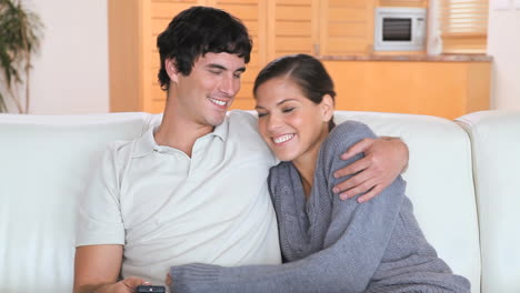 Relaxed-couple-watching-the-television