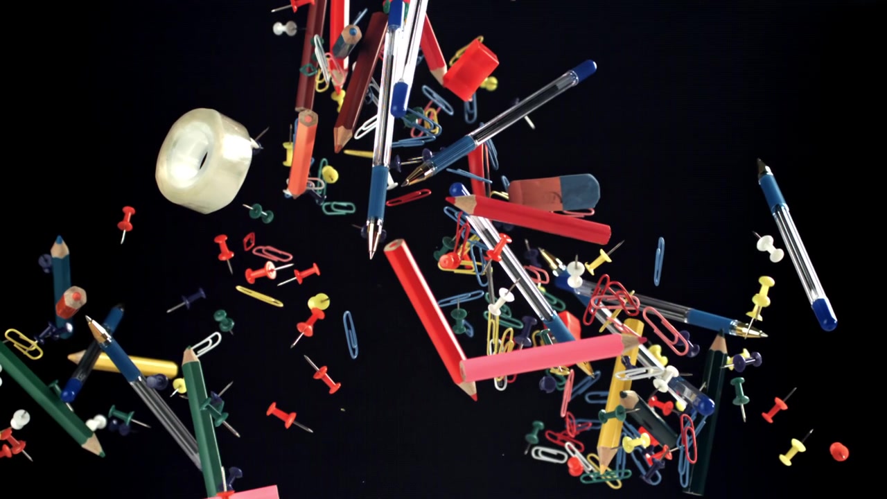 Colorful Office and School Supplies Floating in Slow Motion