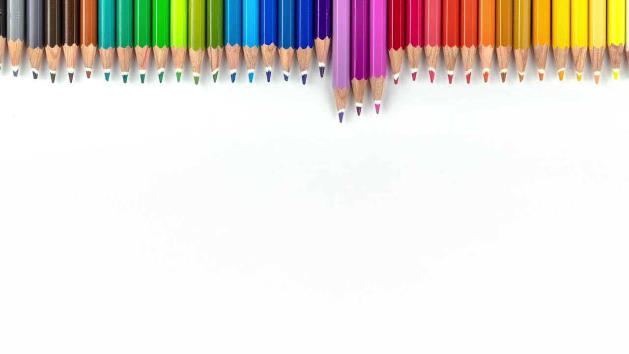 animated frame with colored wooden pencils on a white background, copy space. stop motion seamless looping footage