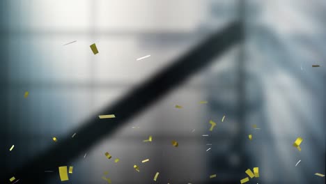 animation of falling confetti over grey background