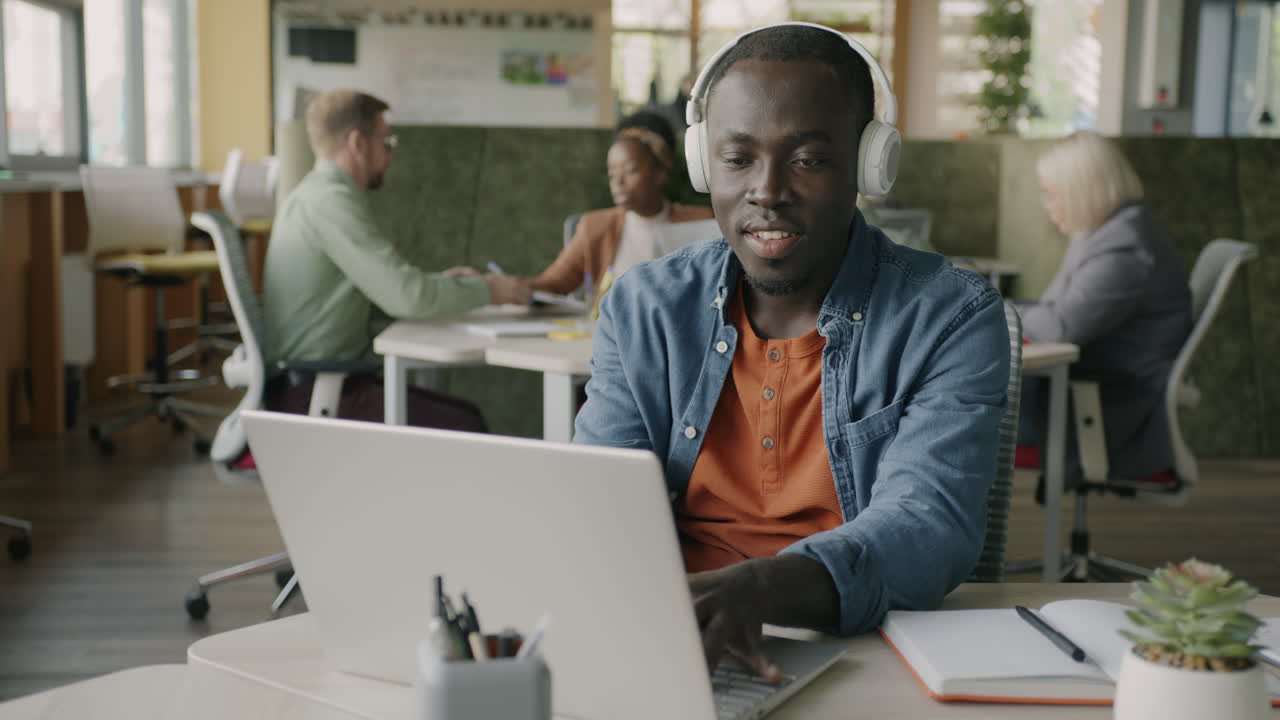 Man working on laptop in office