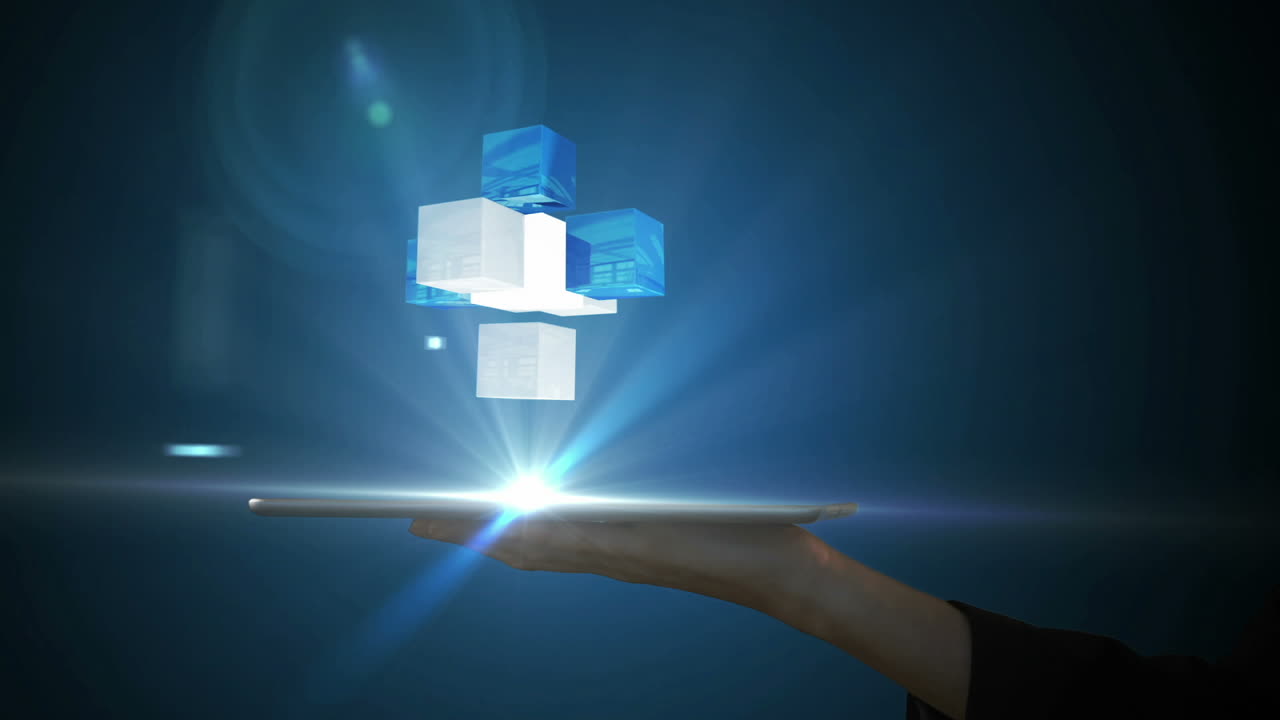 Businesswoman using tablet with holographic cubes