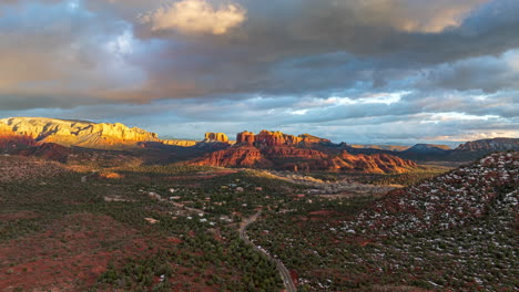 cloudy sky on sunny afternoon with cathedral rock in distance on red rock loop road