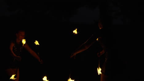 fire jugglers at night