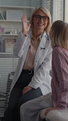 doctor consulting with young patient