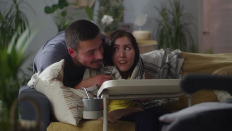 couple supporting a woman at home