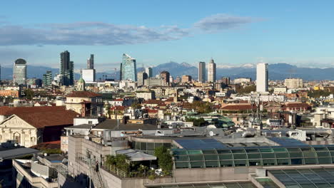 Olympic-Milano-Italy-Italia-Europe-cityscape-mountains-Bergamasque-Monte-Resegone-Alps-city-center-view-from-the-Duomo-Cathedral-Metropolitan-fall-autumn-October-November-Pirelli-Tower-static-shot