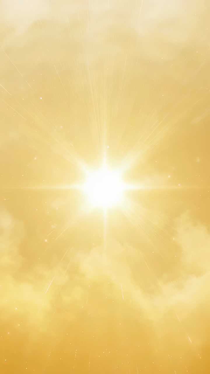 Vertical video: Brightening flare pulsing rayed light in golden sky, sending lens spots