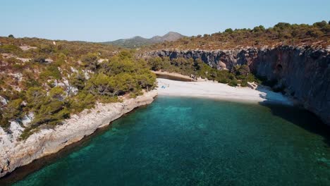 Beautiful-aerial-shot-in-4k-of-a-beautiful-bay-with-turquoise-clear-water-in-Mallorca-Spain