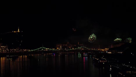 fireworks over the city of budapest on chain bridge, danube river, hungary, 20