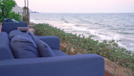 empty outdoor sofa with sea beach view