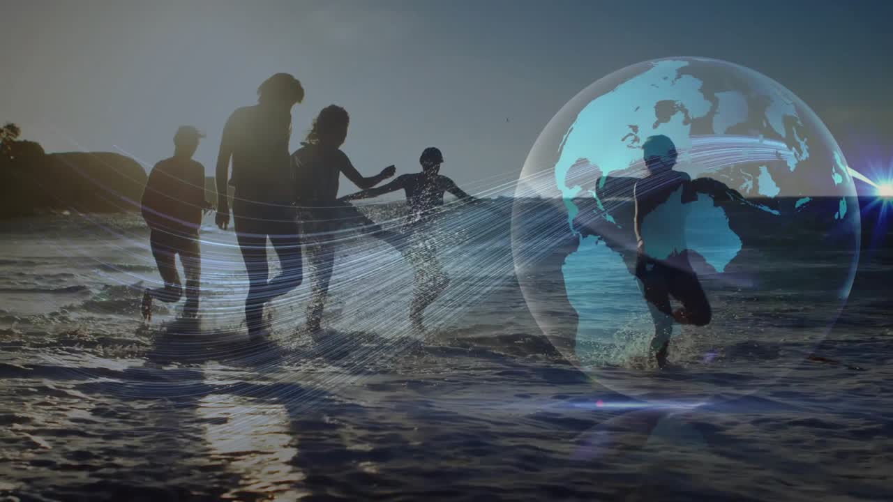 women strolling into surf at sunset starting technology globe fading and mapping dance movements