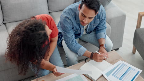 Couple,-writing-and-documents-on-sofa-for-budget