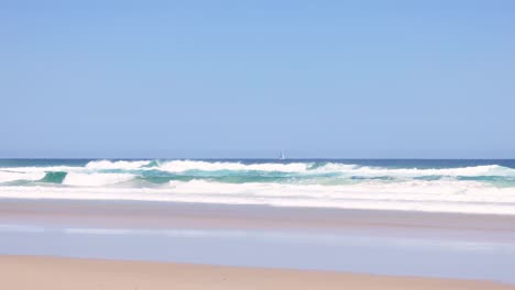 peaceful ocean waves lapping on a sandy beach