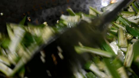 ladyfinger-okra-vegetable-cut-on-pieces-and-being-fried