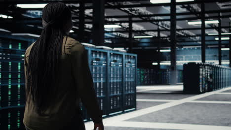 programmer overseeing server farm, ensuring compliance with industry standards