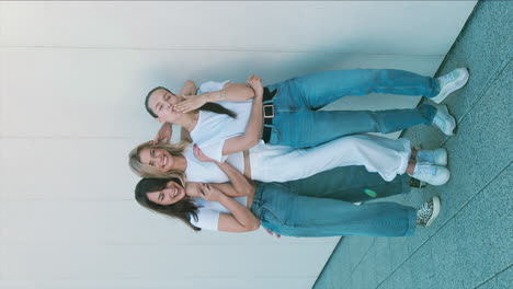 three friends laughing outdoors