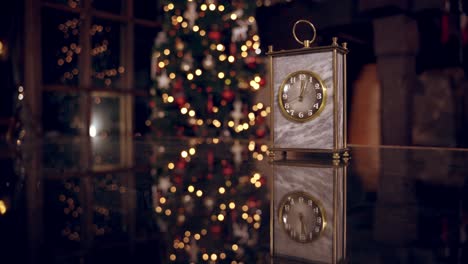 new year clock at midnight. vintage alarm clock showing midnight
