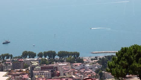 boats and buildings along naples coastline