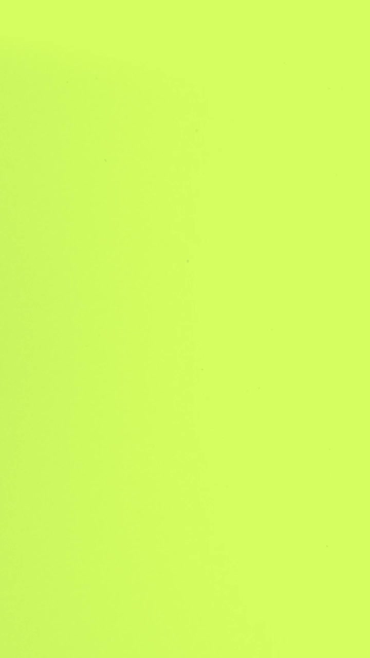 Vertikal video af en limegrøn analog film burn overlay-effekt