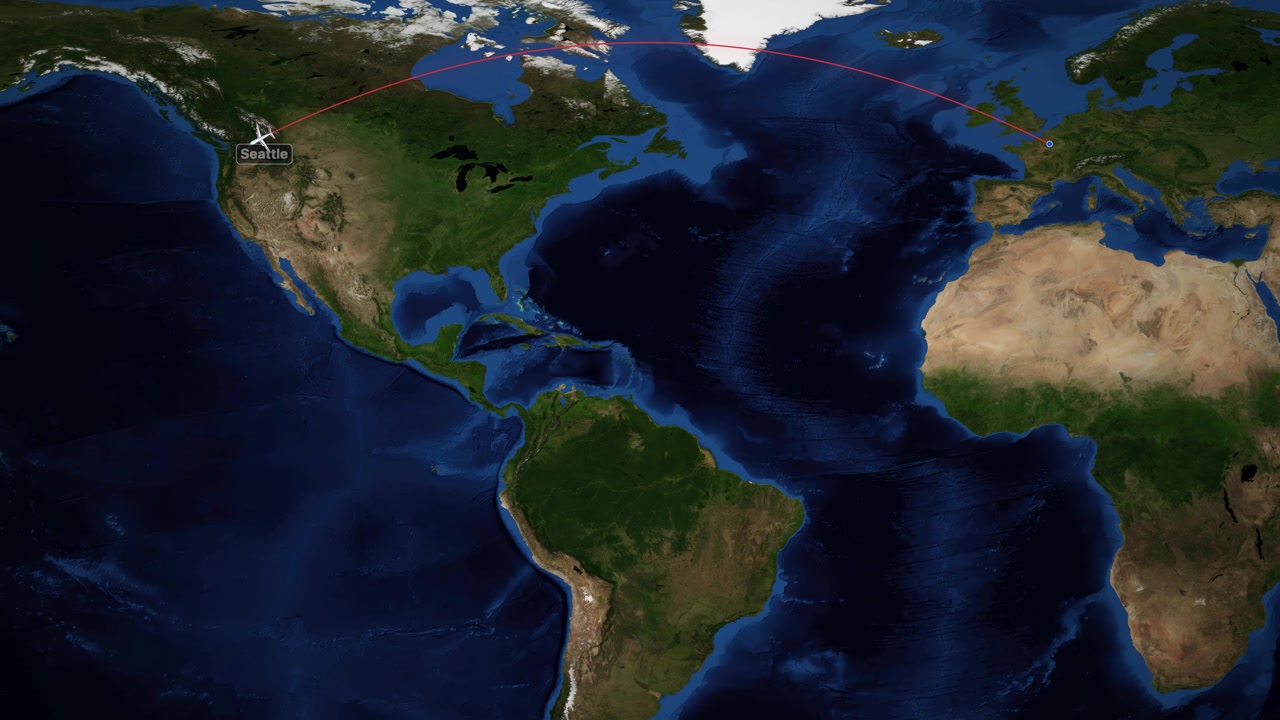 Una mappa del mondo digitale traccia un'icona di aereo che vola da Parigi attraverso l'Oceano Atlantico