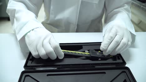 scientist is using accurate vernier caliper equipment to measurement object in innovation research laboratory.