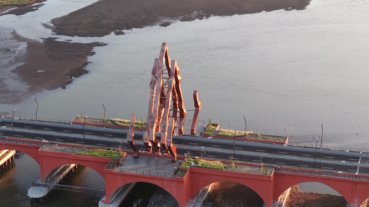 Aerial view of the Pandansimo Bridge at sunset, Bantul, Yogyakarta, as part of the southern ring road route of Java