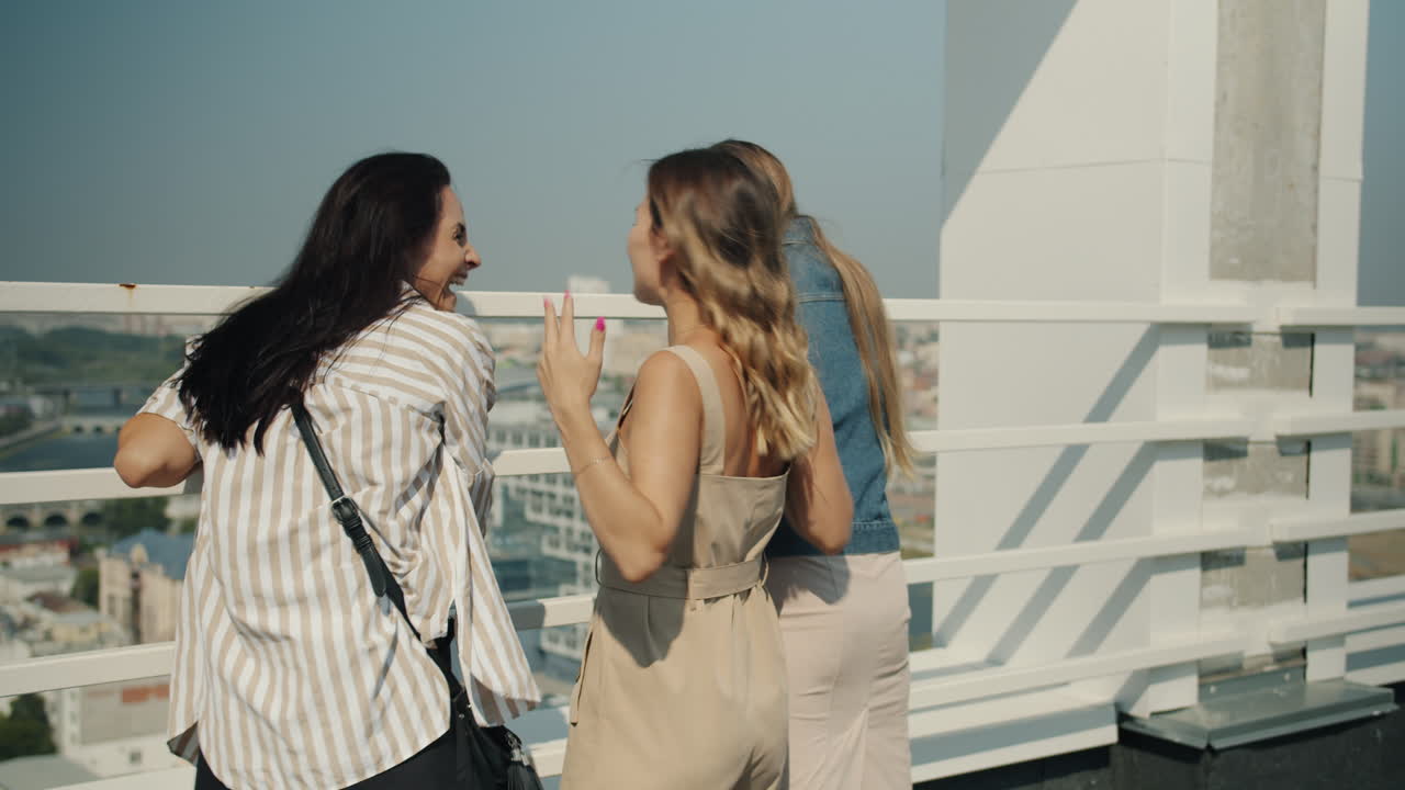 Women Friends Enjoying Rooftop View