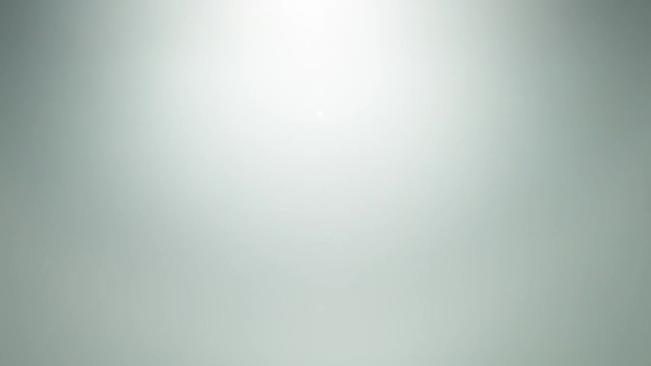 Light leak overlay fading out to black background in slow motion
