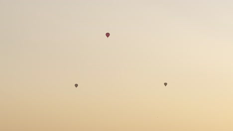 Drone-aerial-view-of-hot-air-balloons-in-the-sky