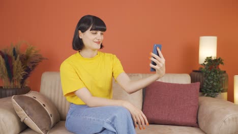 woman making a video call on the phone.