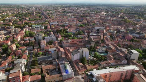 ravenna, italy, drone push in, tilt-up view of urban architecture