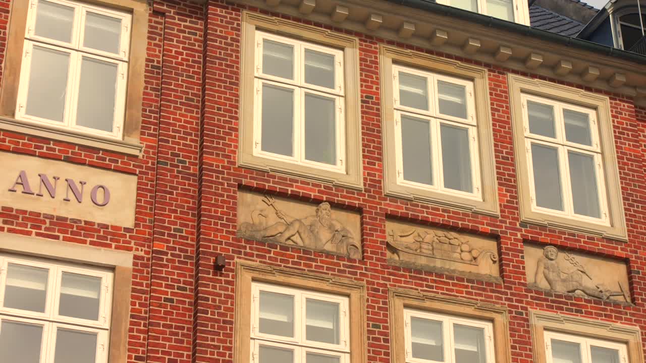 Facade Of The Historic Townhouse Building At Nyhavn 63 In Copenhagen, Denmark. Tracking Shot