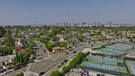 san diego california aerial v59 cinematic low flyover glorietta bay marina capturing coronado residential neighborhood with downtown cityscape on the skyline - shot with mavic 3 cine - september 2022