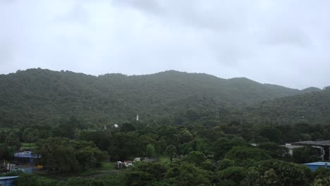 timelaps-of-cloudes-moving-over-green-mountain-in-rainy-seson-