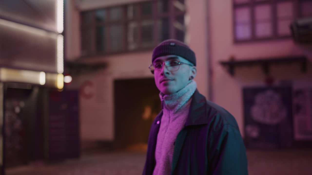 Man in the city at night