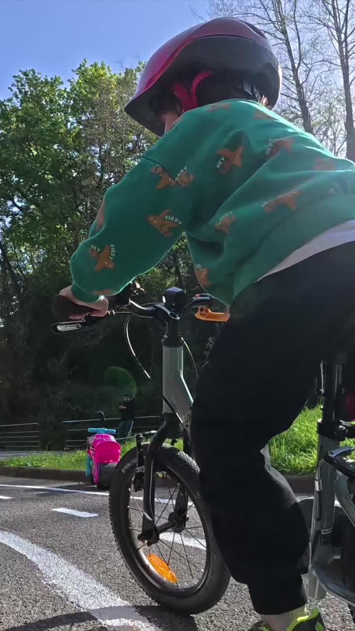 Child riding a bicycle outdoors