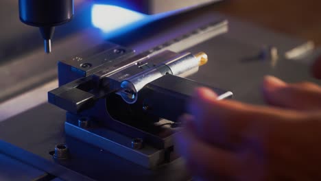 a lock being engraved by a machine