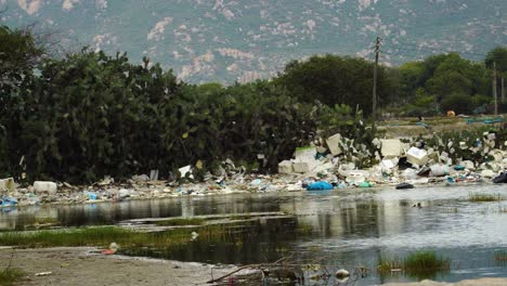 View Of Trash Pollution On Edge Of Riverbank At Son Hai In Vietnam