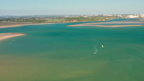 aerial: kitesurfing in the lagoon of alvor