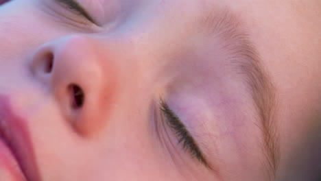 macro portrait of a beautiful, blue-eyed, little girl