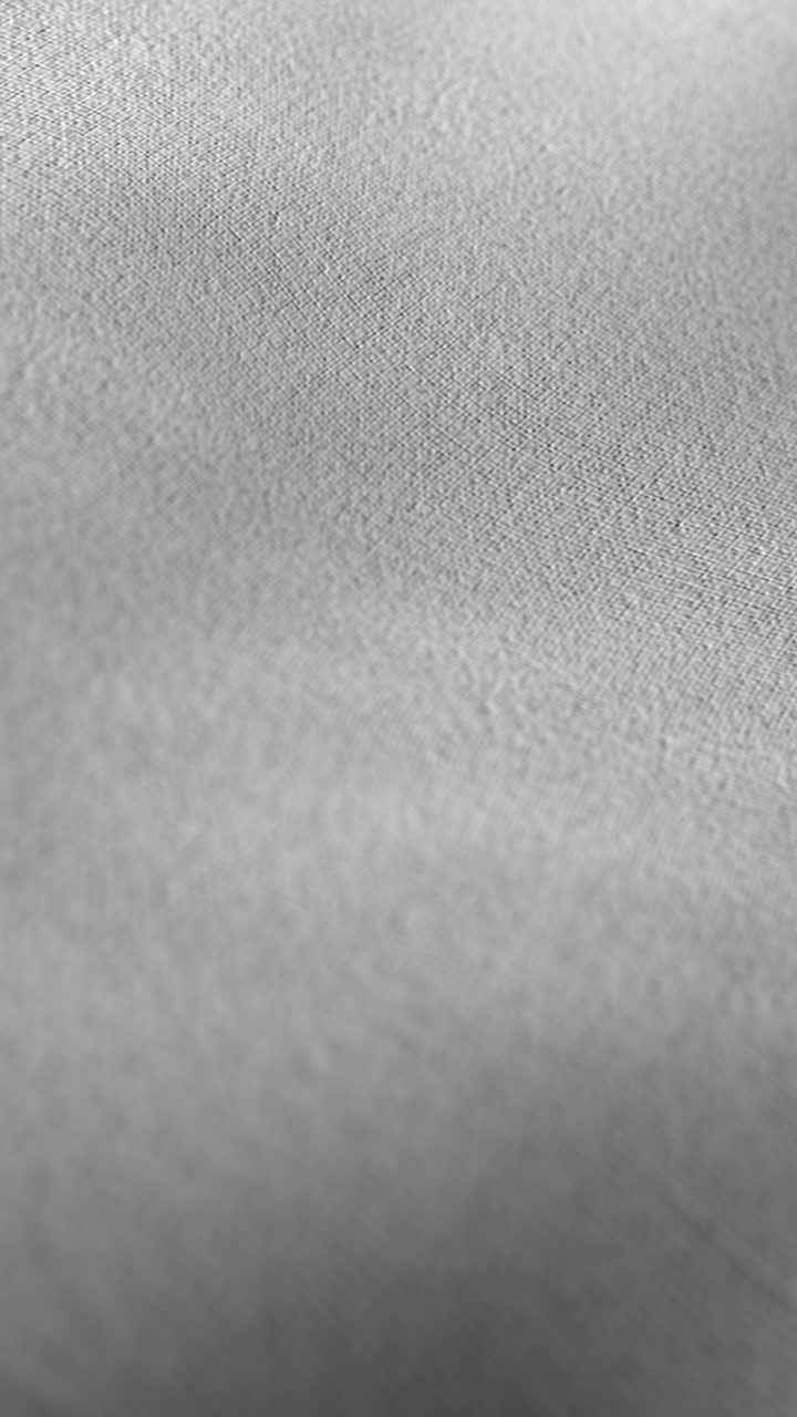 Gray textile macro surface slow motion animation