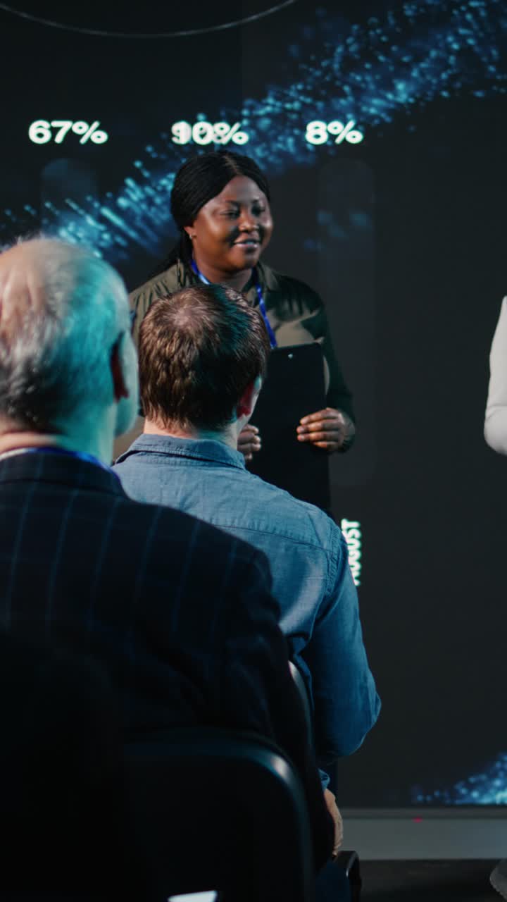 Vertical Video Diverse team of female presenters hosting a business conference