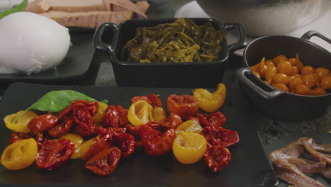 display of all ingredients used by italian pizza chef to make tasty pizza