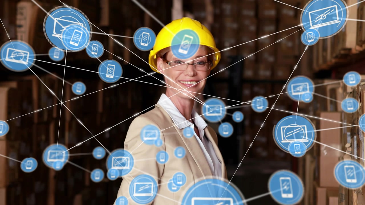 Warehouse manager walking aisle, scanning boxes, activating blue IoT nodes forming network overlay